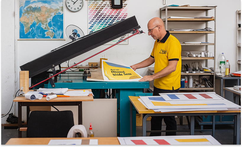 Courier loading parcels into a delivery vehicle